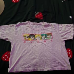 Sailor moon shirt, size 11/12. It’s a crop top it could fit anyone.